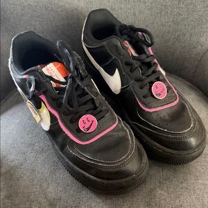 Nike Black Sneakers with Pink and White Accents